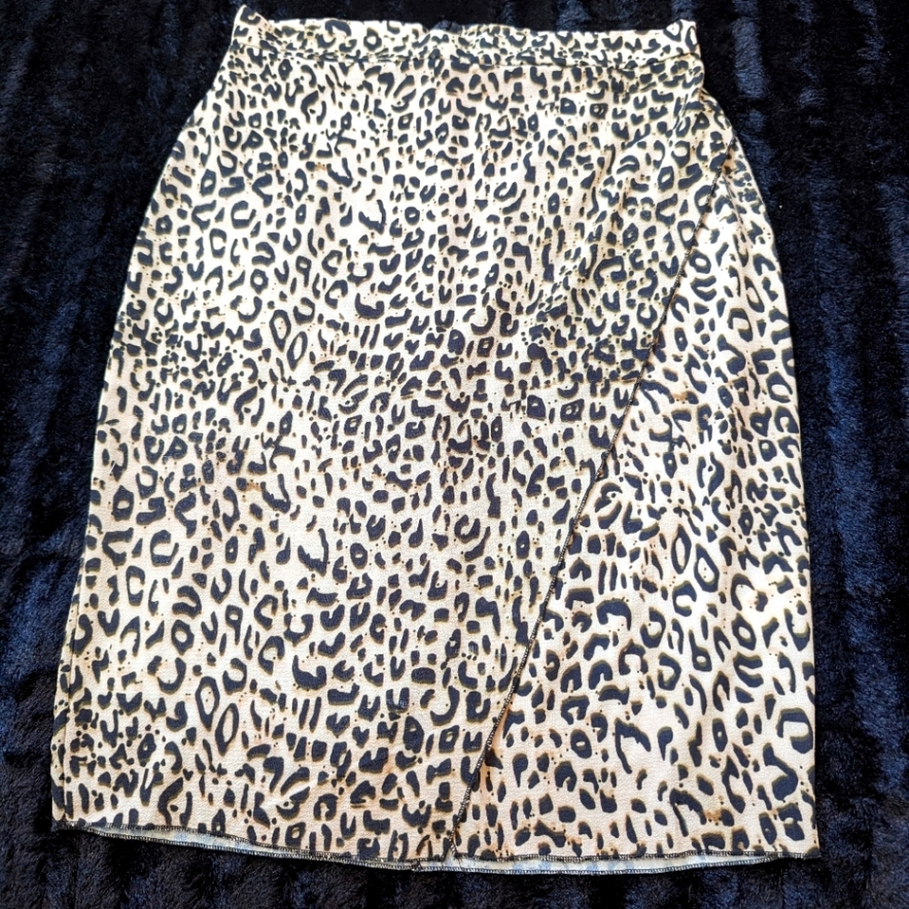 EUC Pretty Little Things animal print skirt.  Faux wrap, back zip size 8